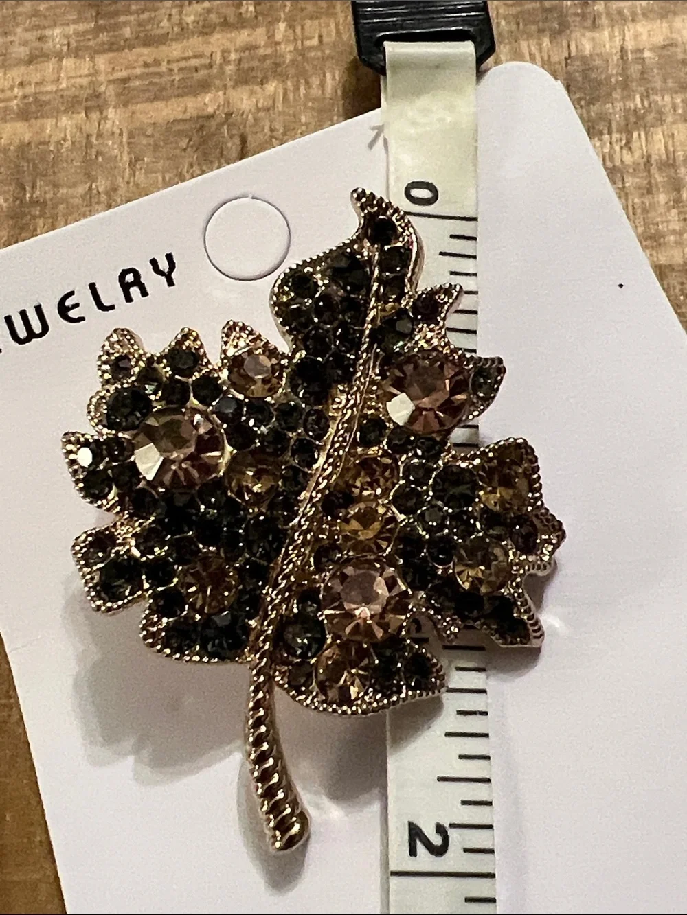 3/$18 Gold Leaf Brooch with Champagne and Black Crystals Lot 6071